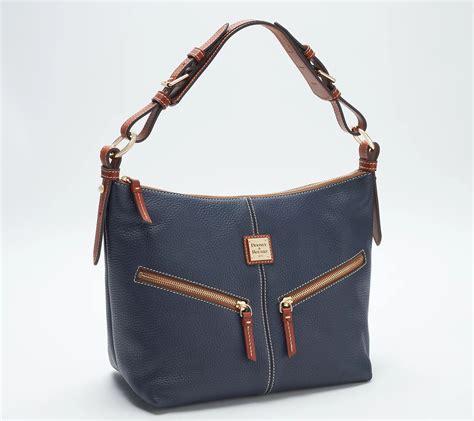 However, every real coach purse has one. . Are the dooney and bourke bags on qvc real
